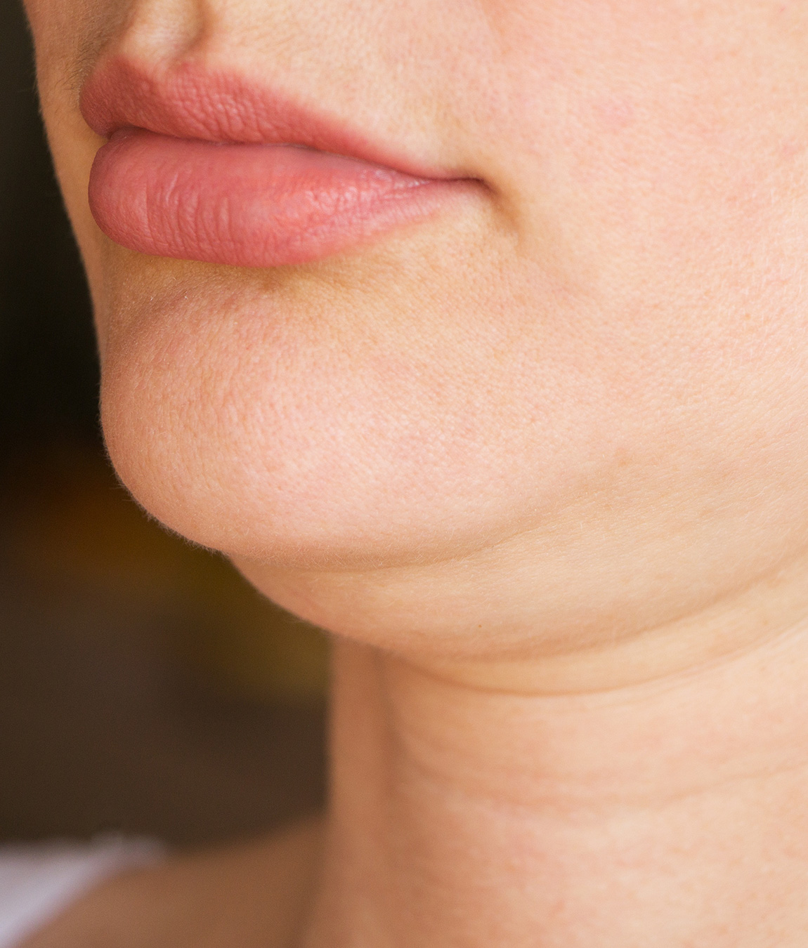 Close-up on a woman's double chin